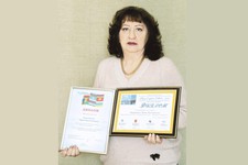 Лариса Ракитянская,  победитель международного конкурса «Город в зеркале СМИ».